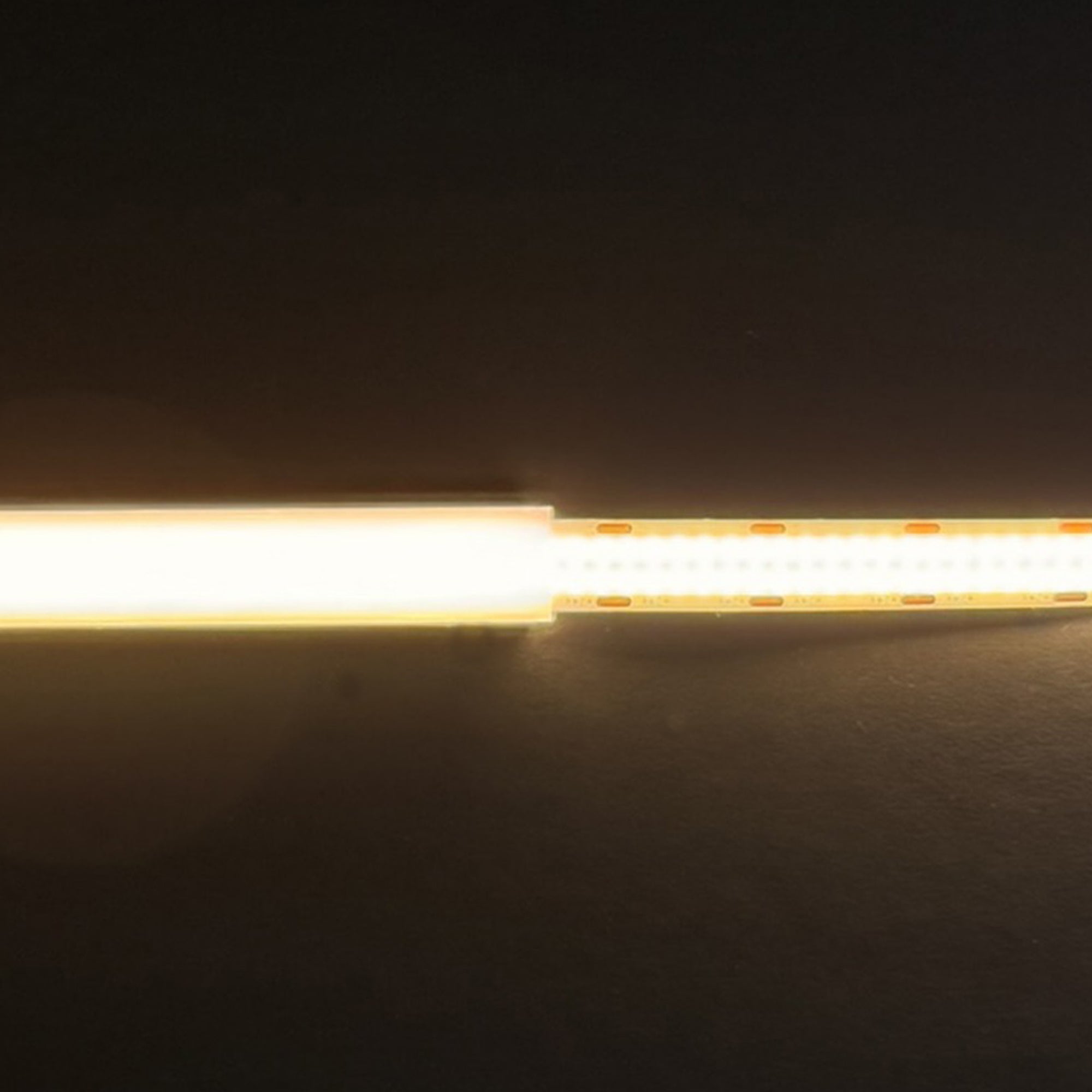 UL listed COB double row LED strip light 24V 12mm indoor showing connected strip section with uniform dotless light output