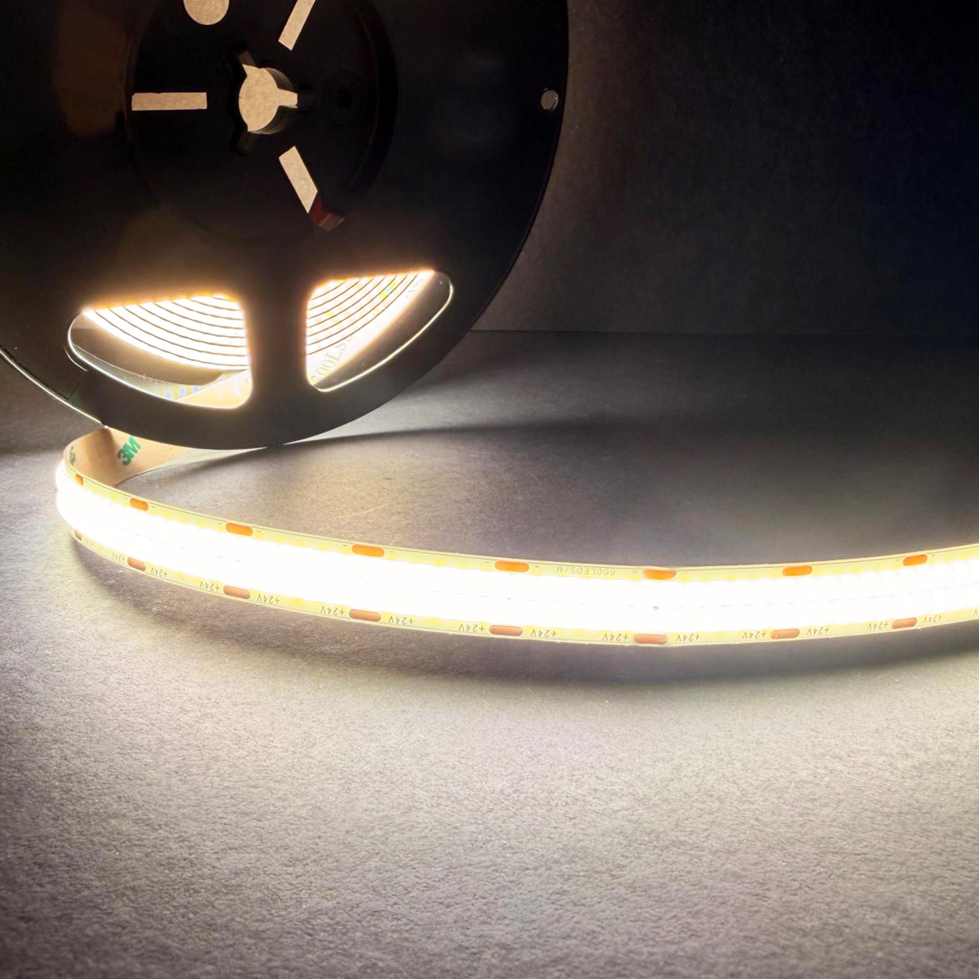 UL listed COB double row LED strip light 24V 12mm showing bright linear indoor lighting from flexible LED strip reel