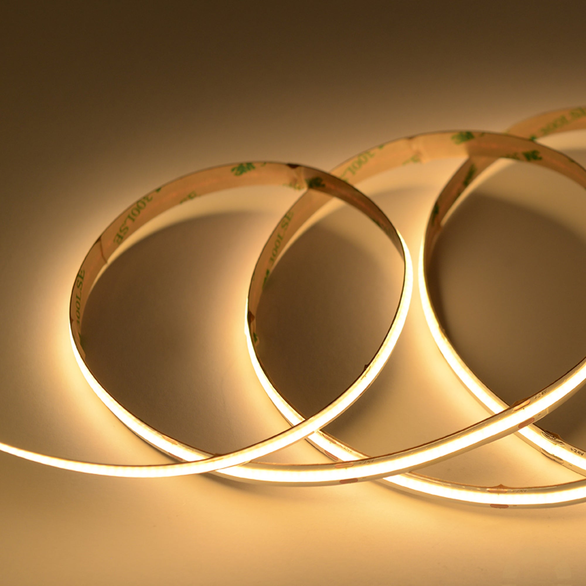 UL listed 24V 10mm indoor COB CCT LED strip light showing flexible bendable strip with warm white lighting effect